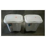 Two RUBBERMAID laundry hampers.