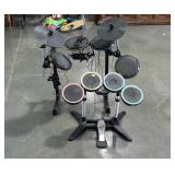 Two X-BOX drum kit accessories.