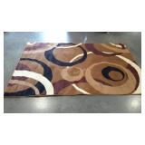Small area rug with circle pattern. Made in