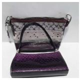 Two purple used purses