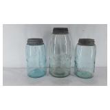 3 mason canning jars, 1 half gallon and 2 quarts,