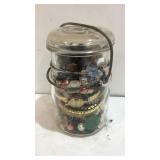 Jar with buttons and watches