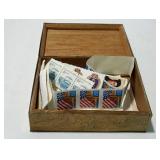 Small engraved brass box with more than $6 in