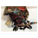 Flat of costume jewelry