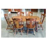 Dining table with one leaf and 6 chairs. One