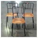 Three metal framed chairs with wooden crosscut