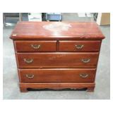 Three drawer dresser. Ready for refinishing or
