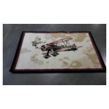 Small area rug with bi-plane theme. 40"×56".