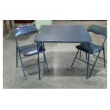 Three piece card Table and two matching chairs.