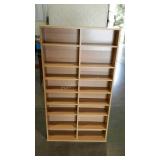 CD/DVD stand with adjustable shelves. 54" high.