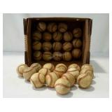 Box with 34 used baseballs.