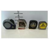 Four smaller tape measures.