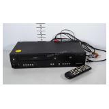 Magnavox DVD / VHS player with remote. Powers on.