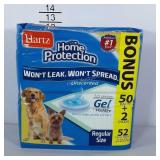 Factory sealed dog pads, each measuring 21"x21".