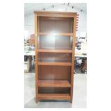 Dark stained bookcase.31"×12"×72".  Seller code