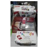 THREE Sizzix die cutting machine and 25