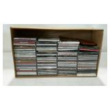 Box of assorted CDs. Mixed artists.