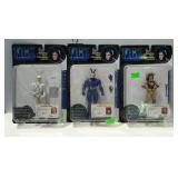 Three The Tick action figures, new card stock.