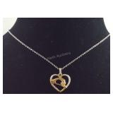 Sterling silver and stainless steel holding hands