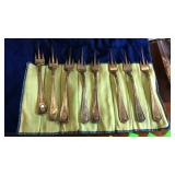 Set of 8 silver pleated speciality forks