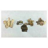 Five gold charms 14k 3.4g