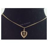 Necklace, pendant is 14k gold chain is not gold