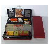 2 Gun Cleaning Kits, & 1 empty kit box