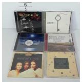 Six music CDs