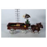 Cast iron Farmers Market wagon with 2 horses.
