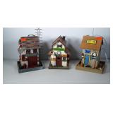 Decorative bird feeders and bird house. Bait shop