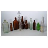 Bottle lot: brown, green, blue and clear glass.
