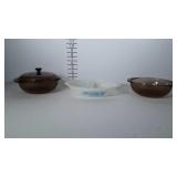 2 pyrex brown glass baking dishes with one