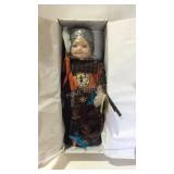 Golden keepsake doll Native American