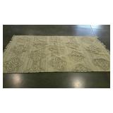 Woven area rug, reversible. Natural colors.