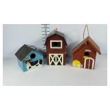Three barn style bird houses