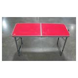 Portable folding table. Adjustable height.