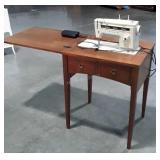 Singer Sewing Machine in nice Walnut Cabinet,