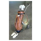 Golf outfit. MacGregor clubs, Victor club grips,