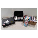 VHS player (powers up), tapes, several are Disney