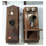 Two old-fashioned wall mount telephone boxes