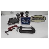 Three trailer balls, 3 hitch covers, 2 c clamps