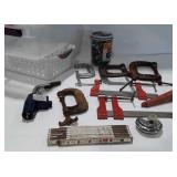 Two containers of C clamps, wooden ruler, propane