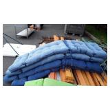 Four Outdoor Chair Cushions, about 22x74", faded