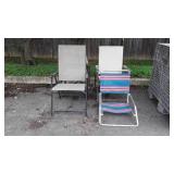 4 chairs, beach chair, two folding chairs, one