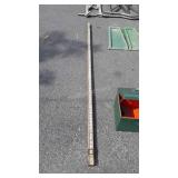 Land surveyors measuring stick