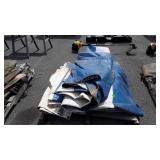Blue and white vinyl tent side tarps, used