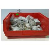 Parts bin with baggies of assorted hardware.