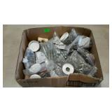 Flat with bags of assorted hardware. Bolts, nuts,