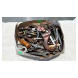 Flat of hardware and tools. Wrenches, blades,