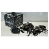 Four used electric drills and one jigsaw in a